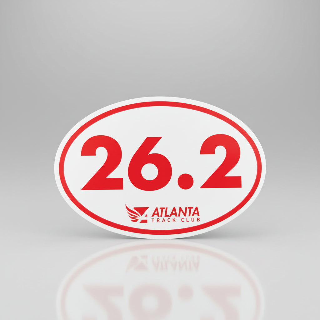 A red and white oval-shaped magnet with the text '26.2' and the Atlanta Track Club logo.