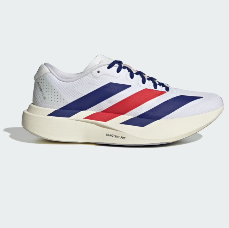White athletic shoe with blue and red stripes on a white background
