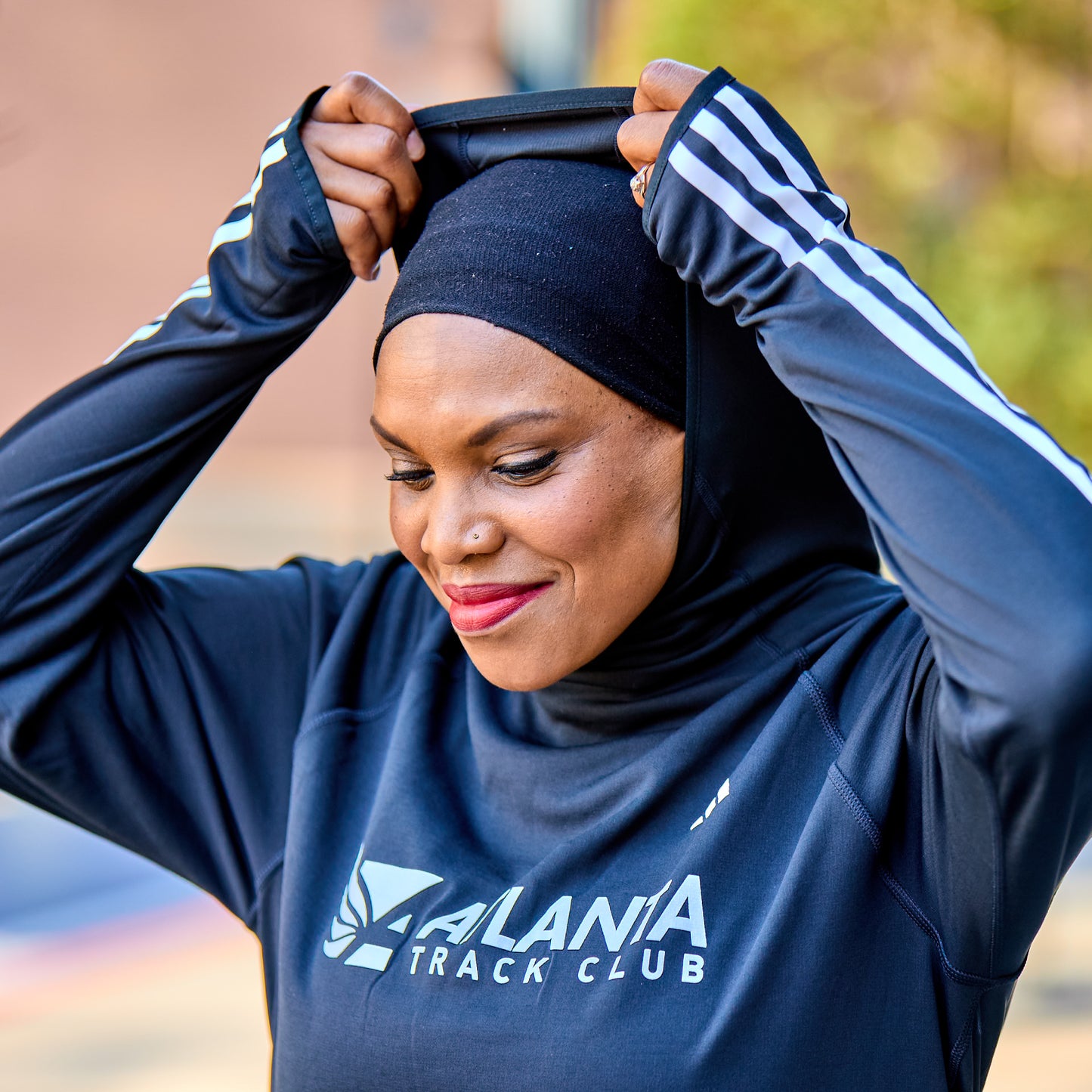 Women's Own the Run 3S Hoodie - Black