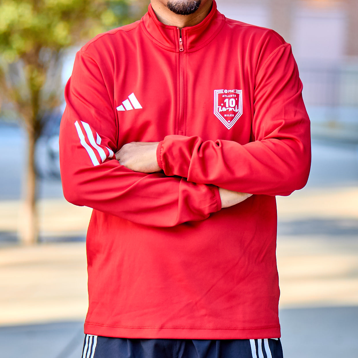 Men's Half Zip - 10M Badge