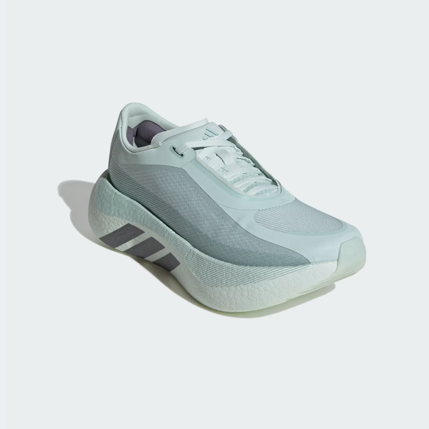 A single Adidas running shoe in a pale icy blue and gray colorway, shown from a three-quarters angle on a light gray background with a soft shadow.