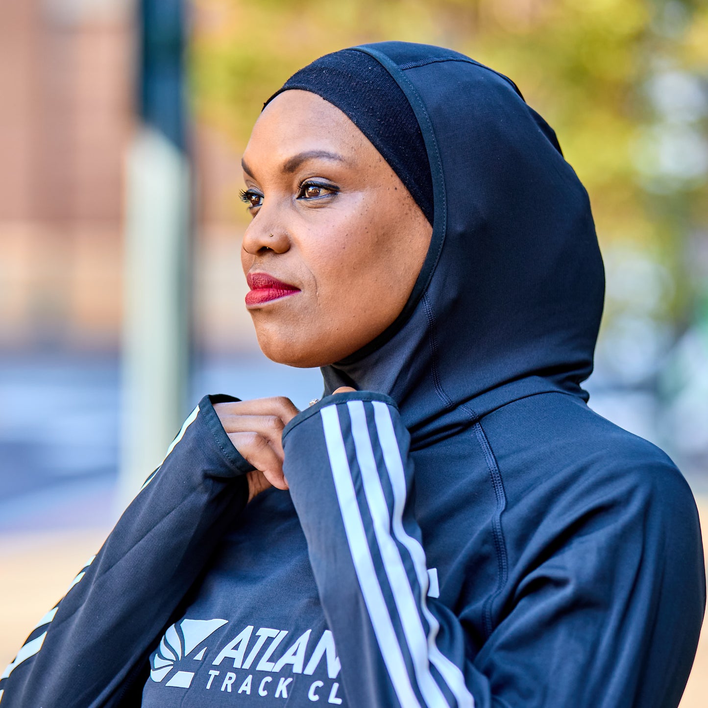 Women's Own the Run 3S Hoodie - Black