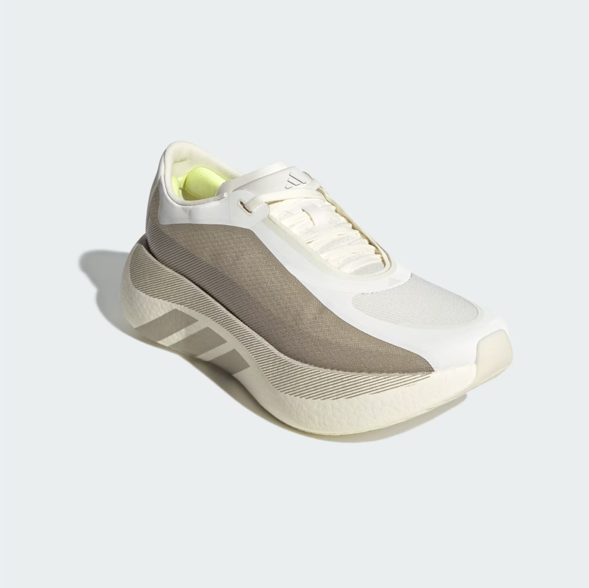 A white and silver Adidas athletic shoe shown from a three-quarters angle against a light gray background.